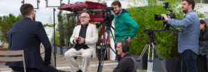 Tournage Passerelles Films sur un toit - Interview de dirigeant